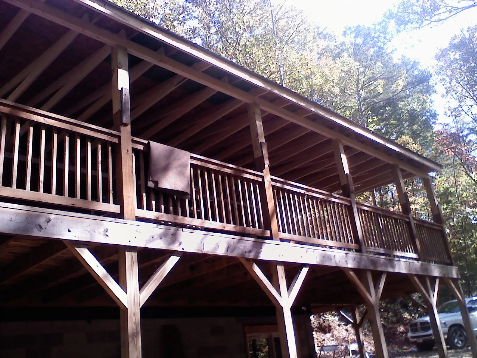 Timber framing under a new elevated porch and deck — Roof Leak Repair in Bemidji by Roofing Brothers